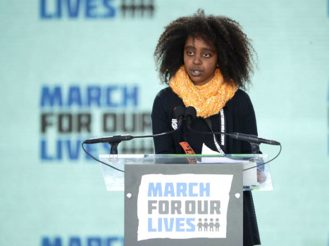 WASHINGTON, DC - MARCH 24: Eleven-year-old Naomi Wadler addresses the March for Our Lives rally on March 24, 2018 in Washington, DC. Hundreds of thousands of demonstrators, including students, teachers and parents gathered in Washington for the anti-gun violence rally organized by survivors of the Marjory Stoneman Douglas High School shooting on February 14 that left 17 dead. More than 800 related events are taking place around the world to call for legislative action to address school safety and gun violence. (Photo by Chip Somodevilla/Getty Images)